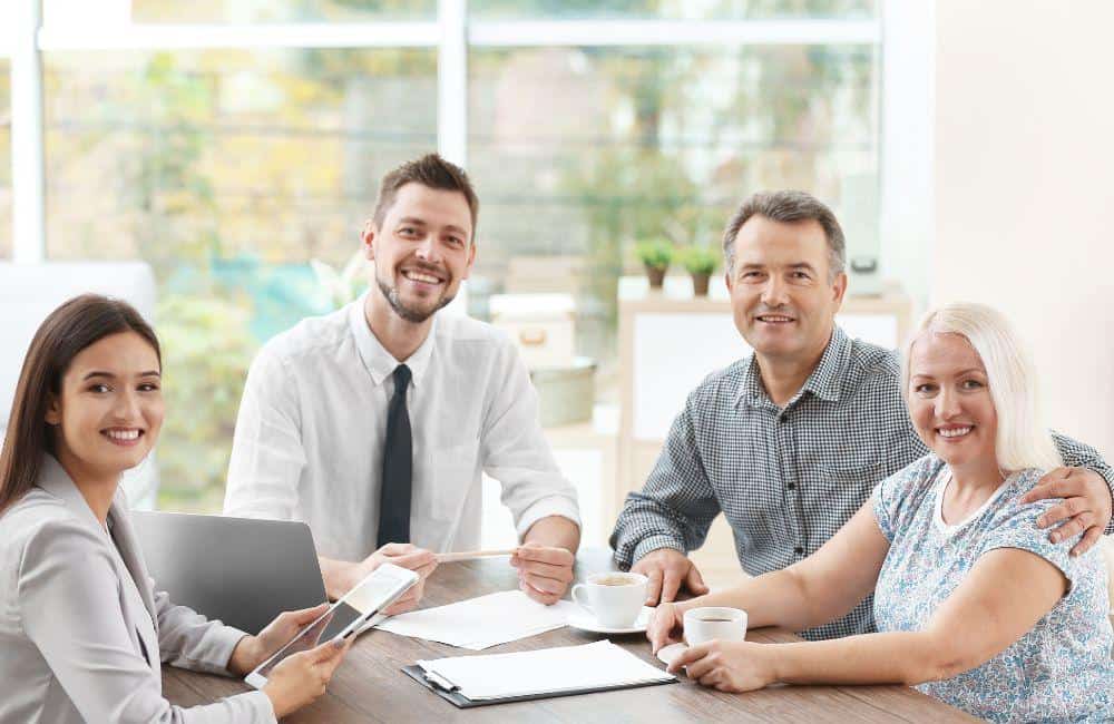 Colorado insurance agent from The Allen Thomas Group working with a client