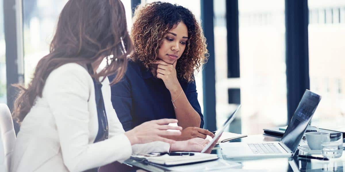 business owner setting up a liability insurance policy with an agent