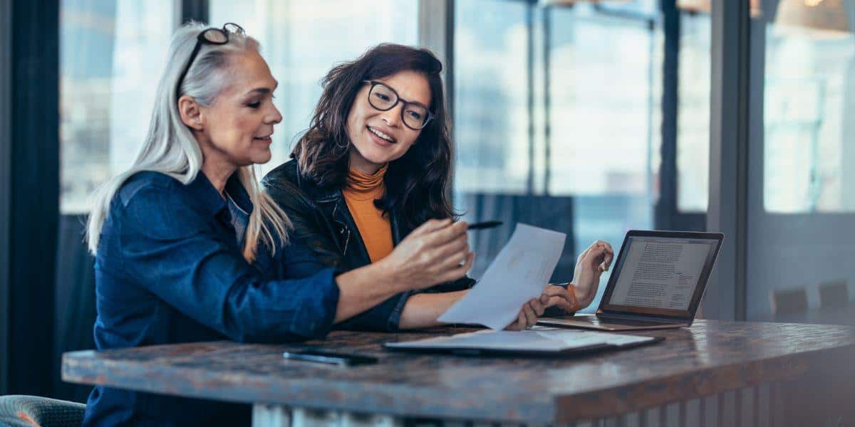 insurance agent from The Allen Thomas Group helping a new franchise owner