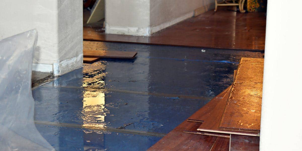 a floor with water damage on it