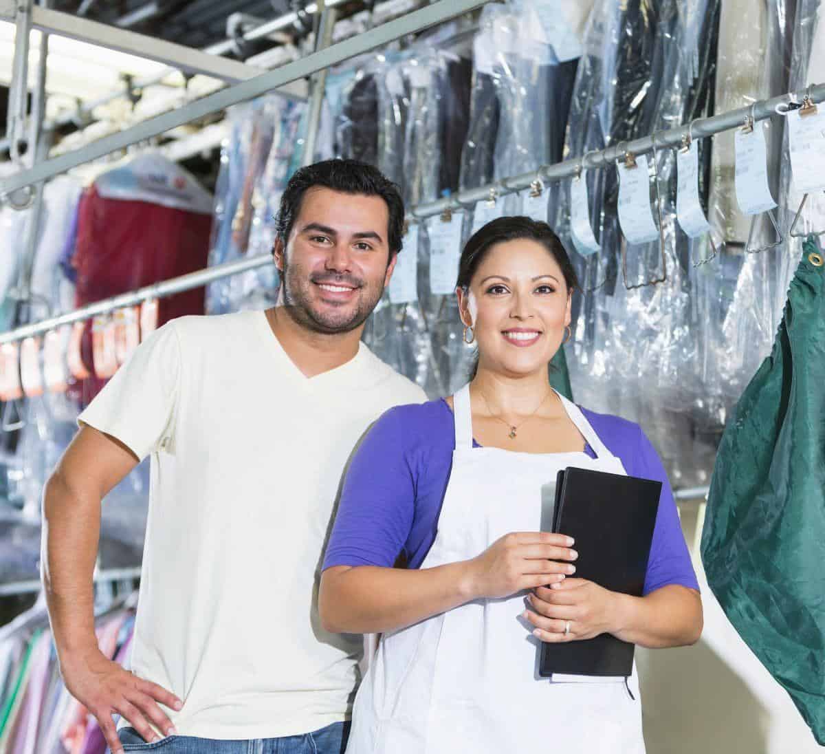 two small business owners in Alabama looking for insurance quotes online